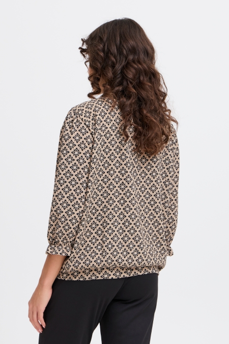 Blouse gauffrée à motifs